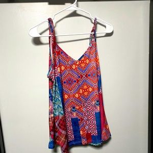 Spaghetti strap, tied at shoulders tank top. Camisole swing top.
